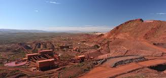 Iron ore price drop slows national trade surplus
